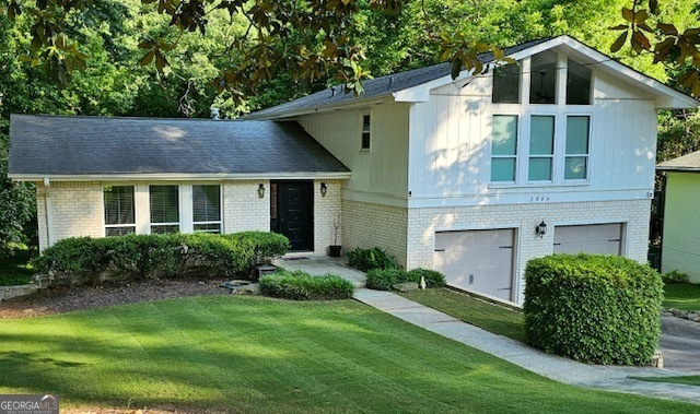 Well maintained home features 3 levels and more space inside than meets the eye