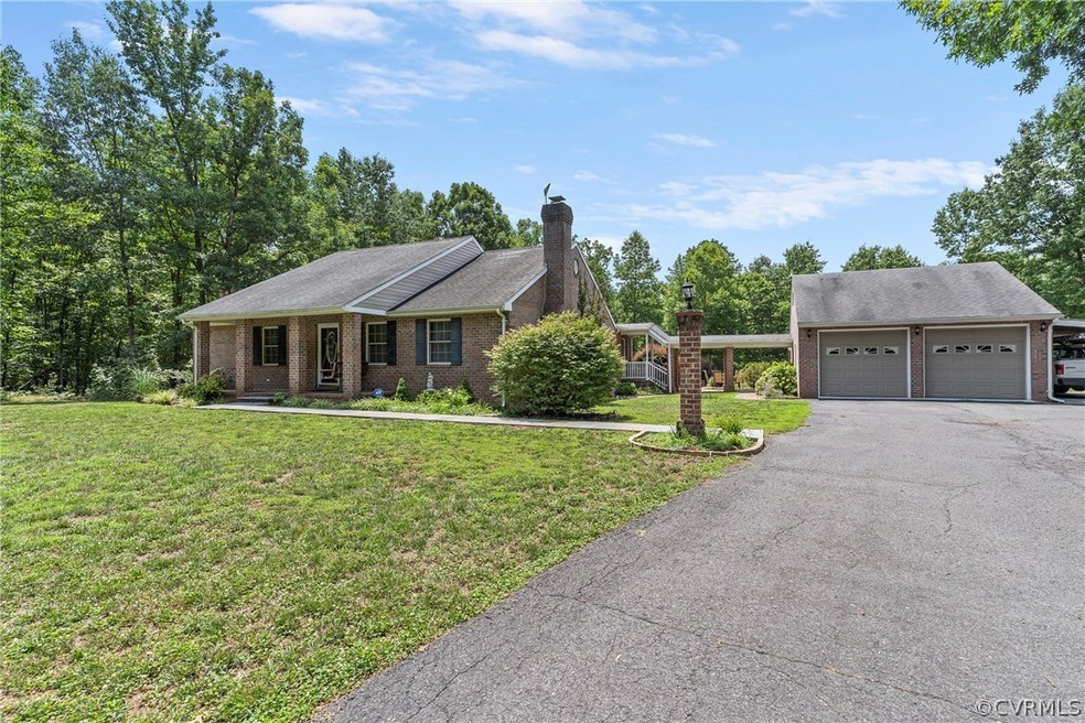 View of front of home featuring a garage and a fro