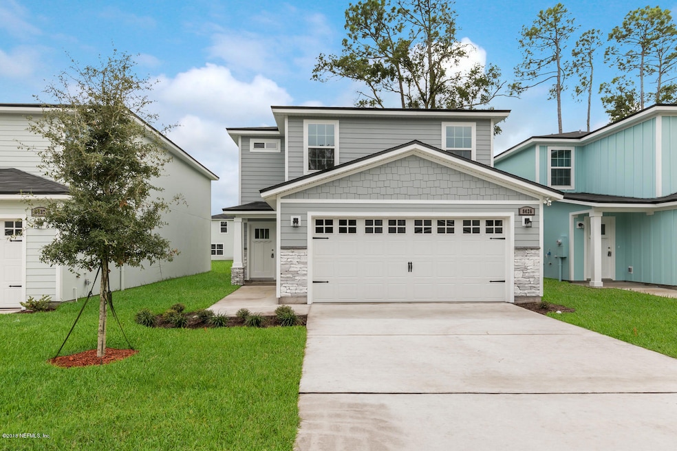 8493 Thor St, Jacksonville, FL 32216 - photo 1