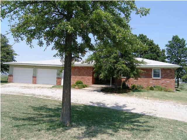 COUNTRY LIVING IN A BRICK RANCH ON SLIGHTLY LESS T