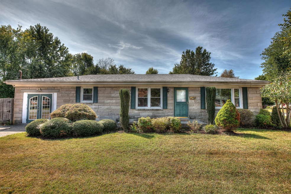 HUGE CORNER LOT w Fenced Back Yard