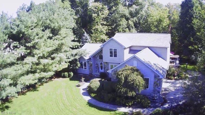 NATURE AWAITS YOU AT THIS 4 BEDROOM 3.5 BATH BEAUTIFULLY CARED FOR CAPE COD HOME - BOSTON LAKE SUBDIVISION