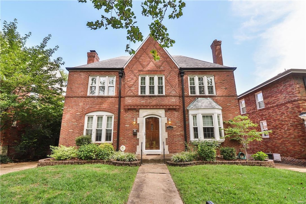 Charming traditional exterior with decorative bric