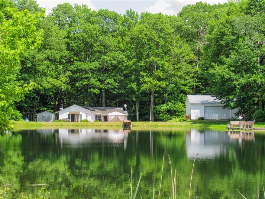 View from across the pond. The deck in the middle 