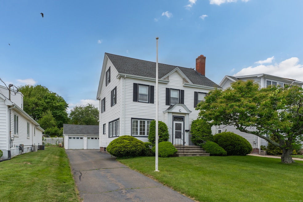Expansive colonial with 2 car detached garage set across from the spectacular West Haven Beach
