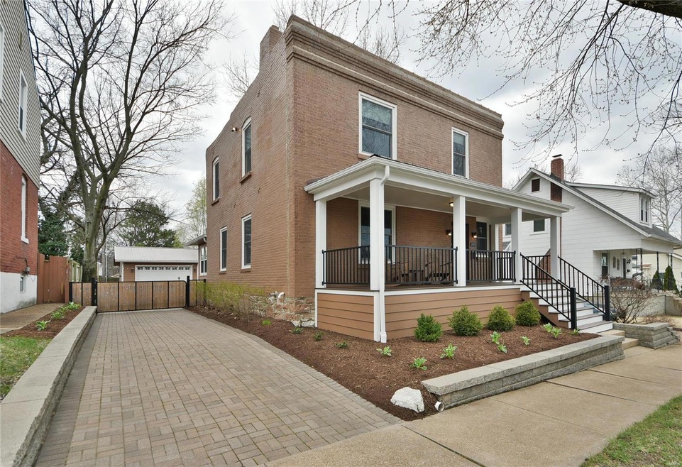 Front Porch is Fully Renovated -Composite Decking- Custom built steel railings.Driveway is made from Holland stone pavers- Custom built Driveway gate- (952 sq ft) GARAGE is a must see!