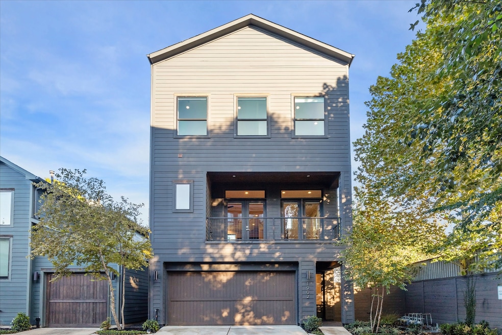 Welcome to this stunning 3-bedroom, 3.5-bath contemporary home offering modern design and exceptional curb appeal. The inviting façade features clean lines, large windows that flood the interior with natural light, and a spacious covered balcony perfect for relaxing or entertaining. Ideally located near shopping, dining, and major Houston attractions, this home combines style and convenience in one beautiful package.