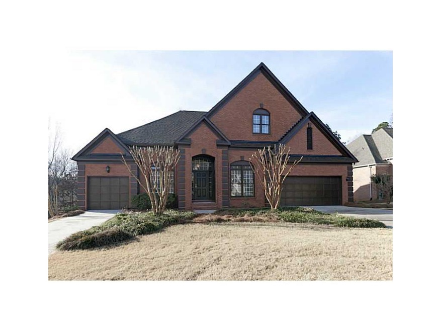 Exterior Front. 3 sides brick