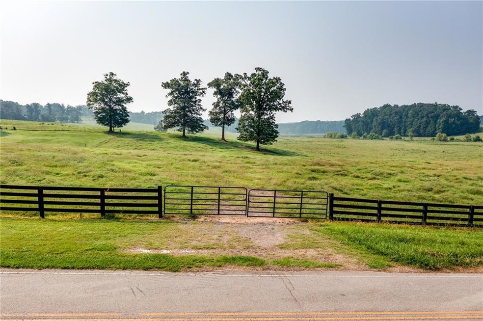 View of yard with a rural view