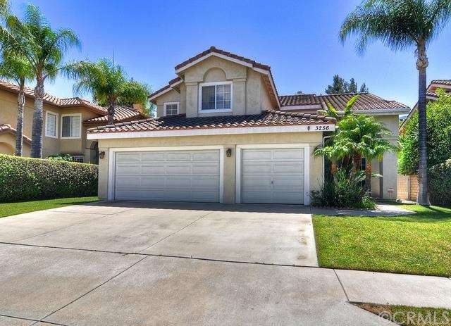 BORDERING YORBA LINDA AND ANAHEIM HILLS, THIS EXQU