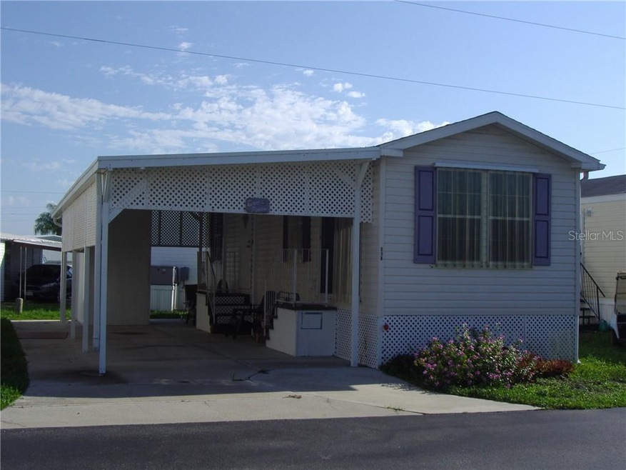 Nice unit with attached carport in a waterfront co