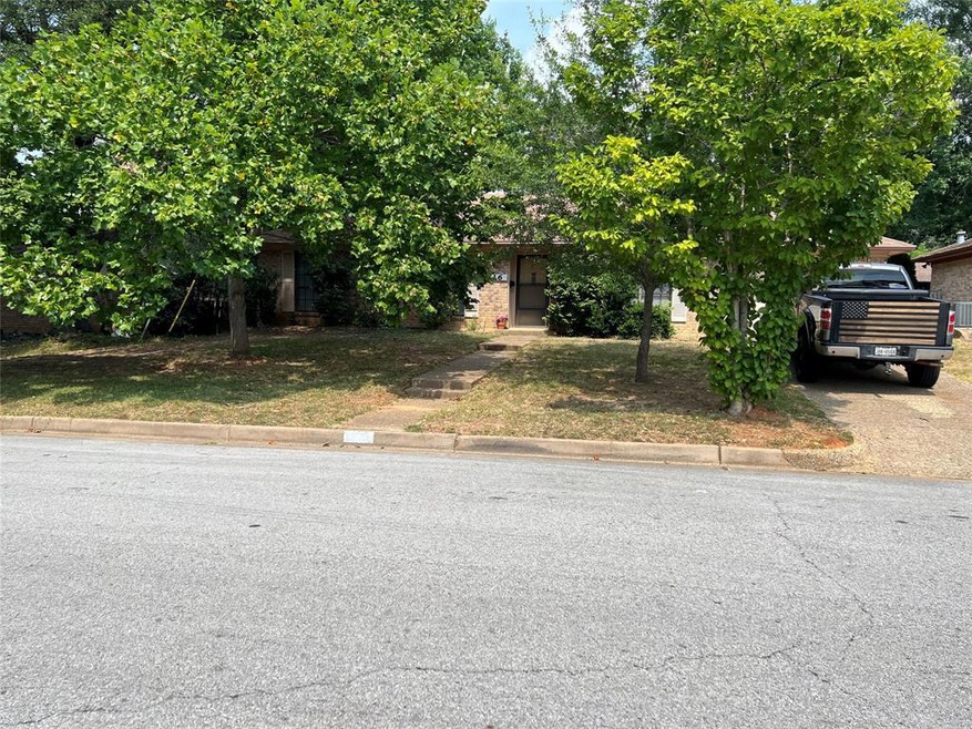 Beautiful trees shading the front of house