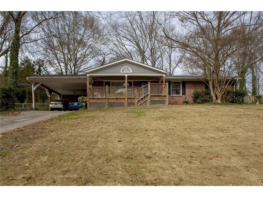 THREE BEDROOM CHARM ON A LARGE LOT