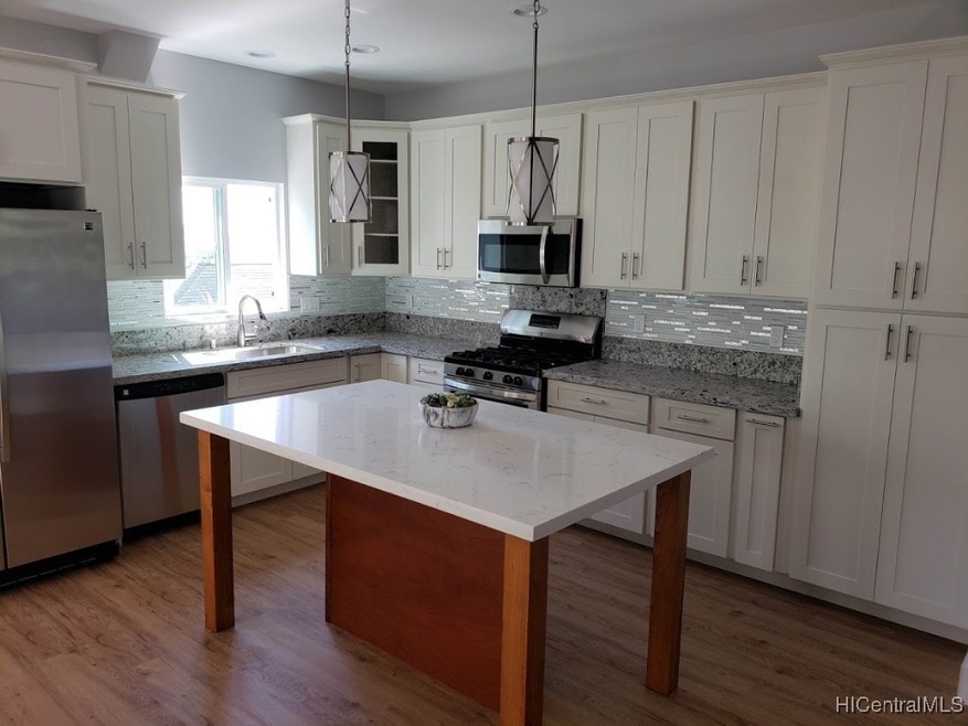 Beautiful Kitchen. Custom made dining table & isla