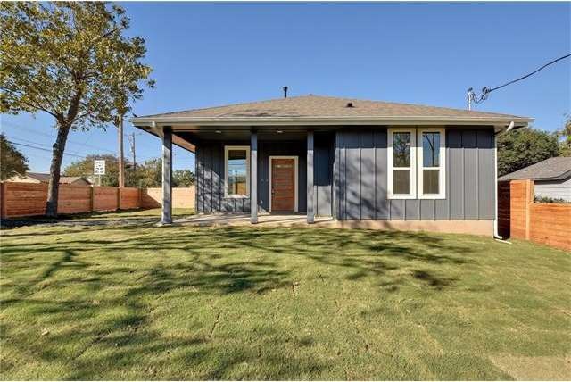 Front of house with beautiful original siding. Lar
