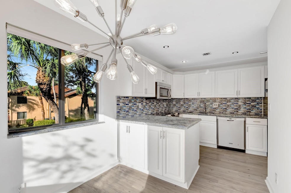 5334 Fountains Dr S unit 221, Lake Worth, FL 33467 - photo 1