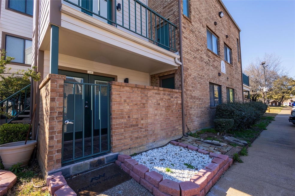 Entrance to property with brick siding