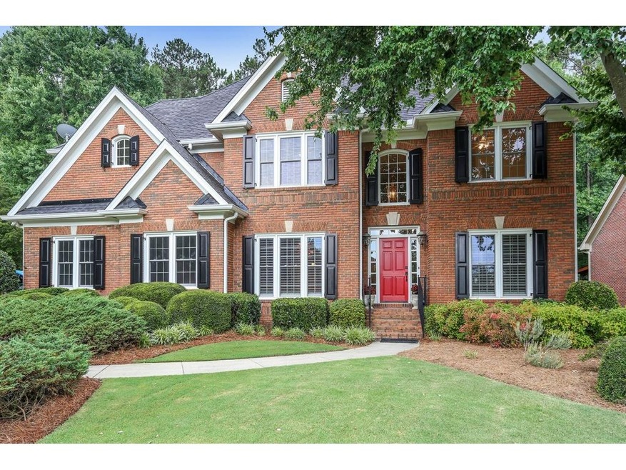 Beautiful brick home on a stately corner lot in po