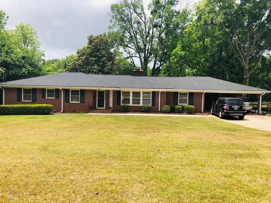 208 Spencer St, Barnesville, GA 30204 - photo 1