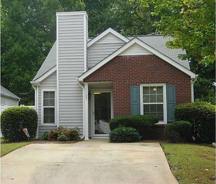 Exterior Front. This Traditional home features bri