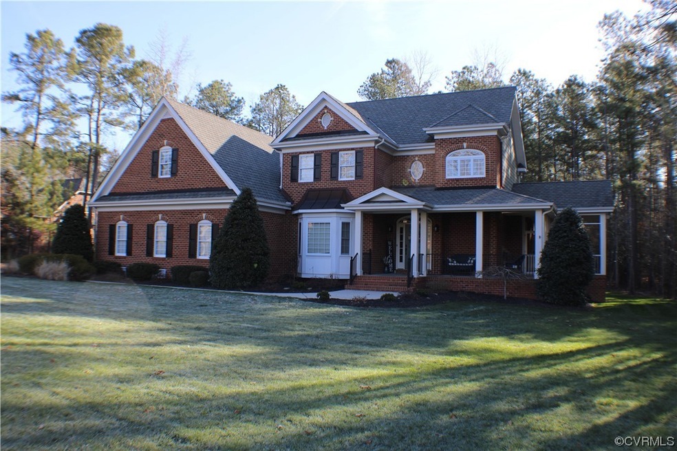 Gorgeous, stately brick home w/ exquisite first fl