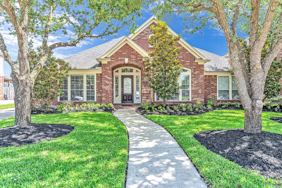 Welcome home to this beautiful Perry home with excellent curb appeal and is adorned with beautiful mature landscaping.