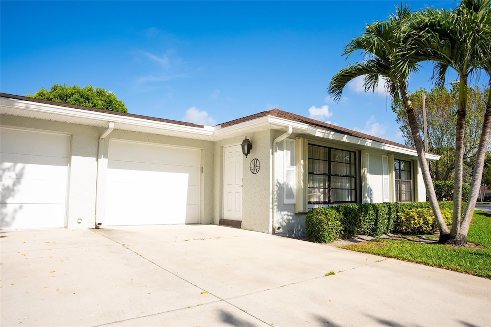 9870 Pecan Tree Dr unit B, Boynton Beach, FL 33436 - photo 1