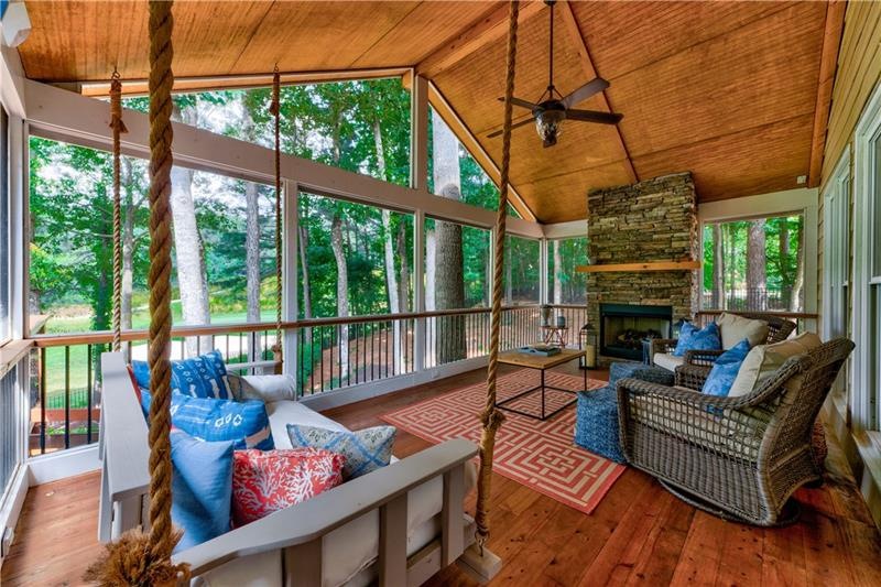 Custom porch addition to home with gas fireplace a