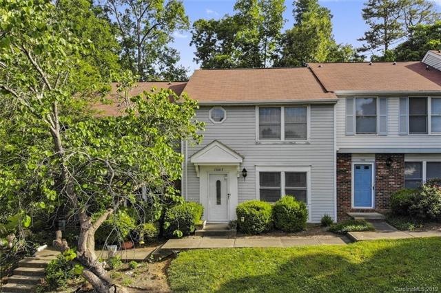 FRONT: Attractive two story town home with low mai