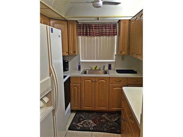 228 Sheffield J, West Palm Beach, FL 33417 - photo 1