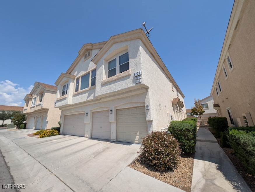 View of front of property with an attached garage,