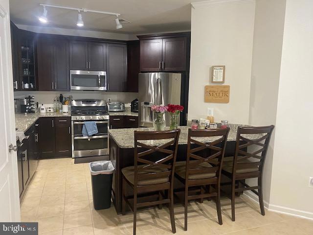 24660 Woolly Mammoth Terrace unit 406, Aldie, VA 20105 - photo 1