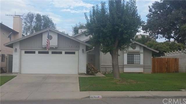 Great curb appeal with lush green grass.