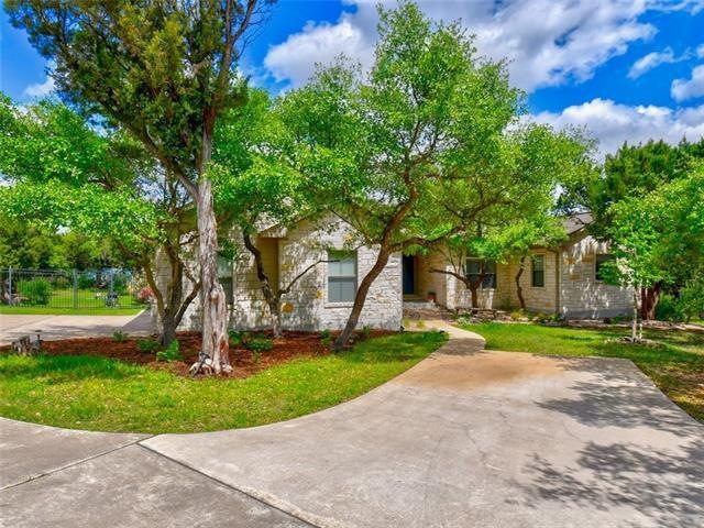 beautiful home nestled off street, nestled among the trees