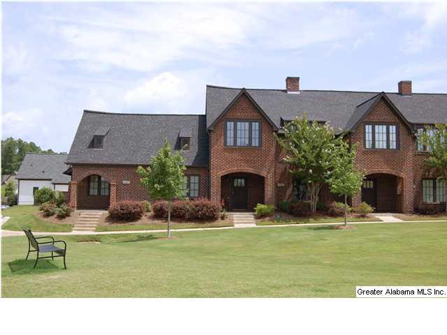 WOW! Look at this ELEGANT 1 1/2 level, all brick t