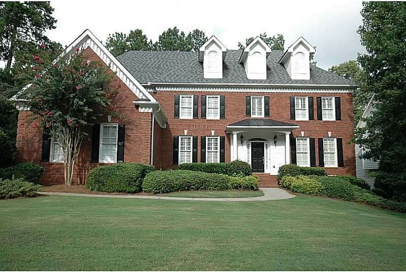 Exterior Front. Stunning 4 sided brick beauty on q