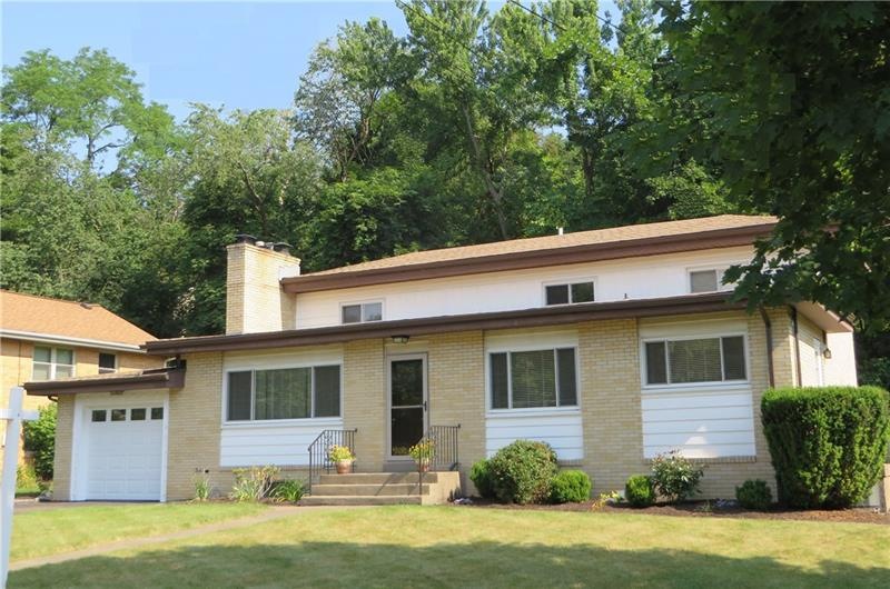 This 4 bedroom Multi-level Home is Beautifully Mai