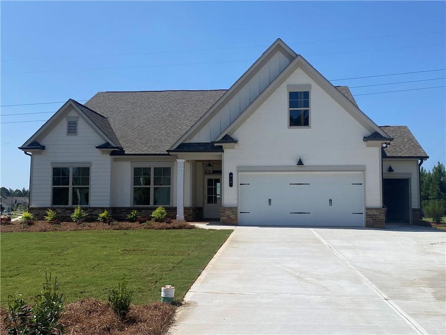 Large corner lot with added carriage garage.