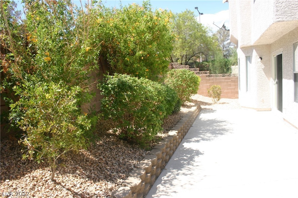 Rear Yard,Mature Bushes, Patio off of Family Room