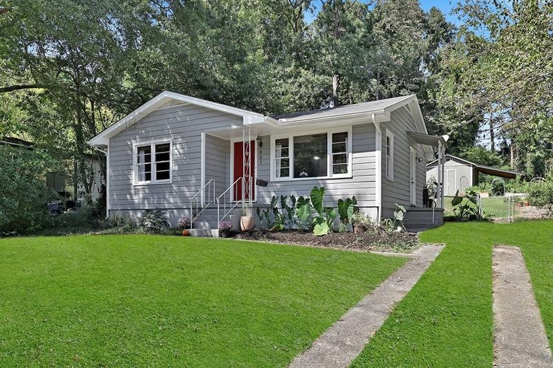 Front yard picture has been edited.  Large tree re