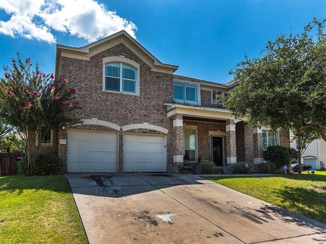 Soaring front elevation greets you upon arrival!