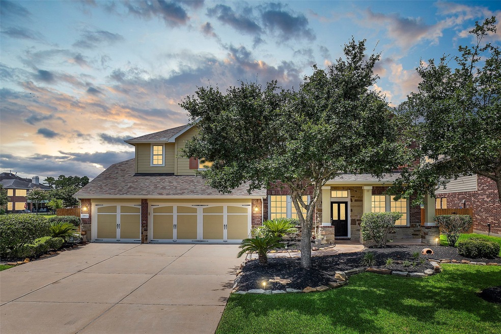 10,200 SF LAKEFRONT LOT! Welcome home to this beautiful 5 Bedroom, 3 1/2 Bathrooms, w/a 3 CAR GARAGE with epoxy floor. Downstairs you will find beautiful wood floors throughout. Everyone will want to gather in the spacious island kitchen & family room with BEAUTIFUL VIEWS OF THE LAKE. Downstairs you also have a Formal Dining Room & Study along with the Primary Bedroom Suite, MUD ROOM, & Utility Room. Upstairs you will find 4 large bedrooms w/big closets, 2 w/a Hollywood Bath between them(cont.)