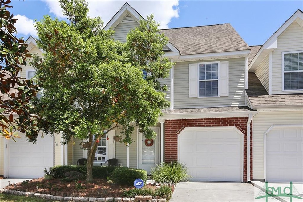 Beautiful townhouse with mature landscaping