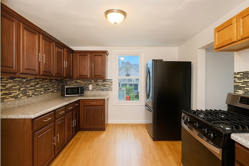 74 Grand St unit 1, Lowell, MA 01851 - photo 1