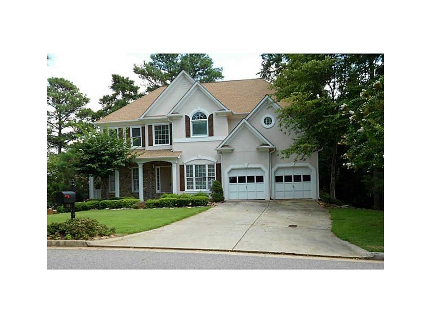 Exterior Front. Level, Wooded cul-de-sac location 