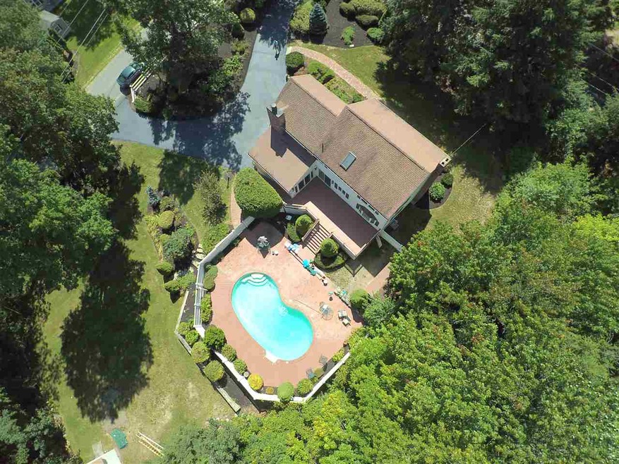 Dramatic inground gunite heated pool awaits your n