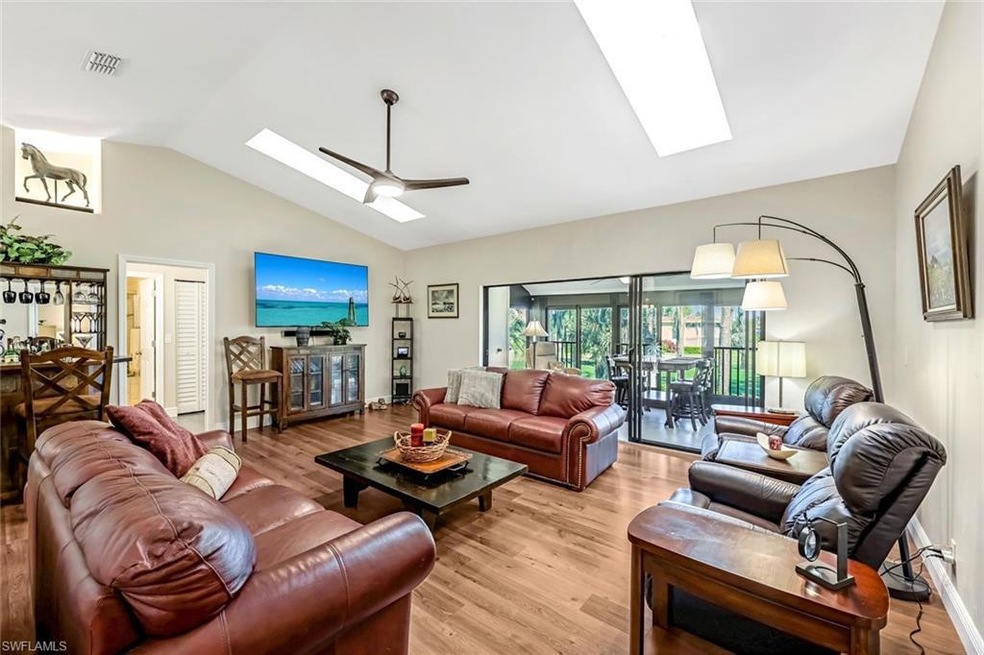Living room with light wood-type flooring, lofted 