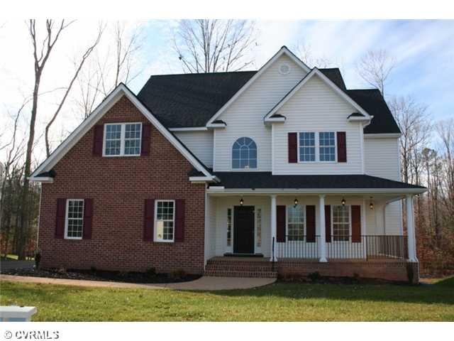 Exterior Front - MAINTENANCE FREE BRICK & VINYL SI