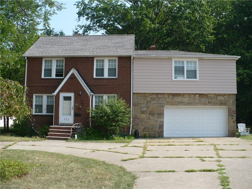 Fabulous stone and brick colonial with semi circul