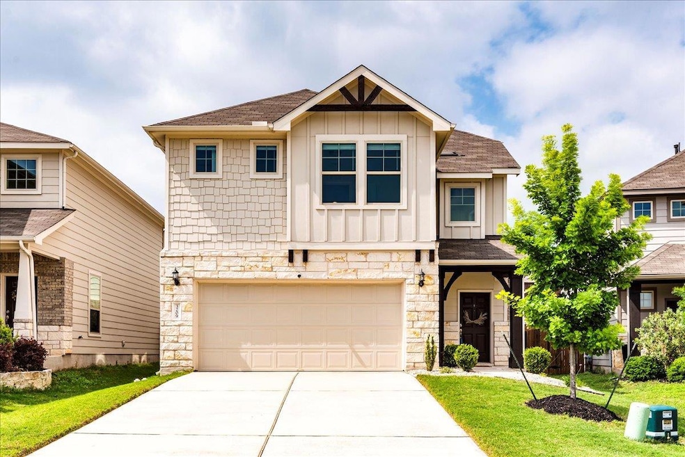 Craftsman inspired home featuring a front yard, s